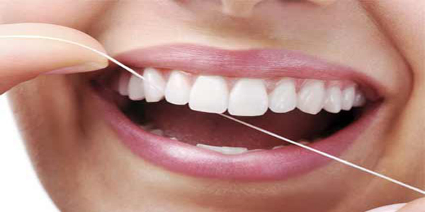 روش صحیح نخ دندان کشیدن